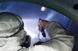 Intermediate coat spraying
